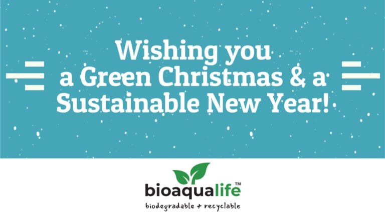 bioaqualife: A blue card with white text: "Wishing you a Green Christmas & a Sustainable New Year!" Snowflakes in the background and the "bioaqualife" logo with "biodegradable + recyclable" below.