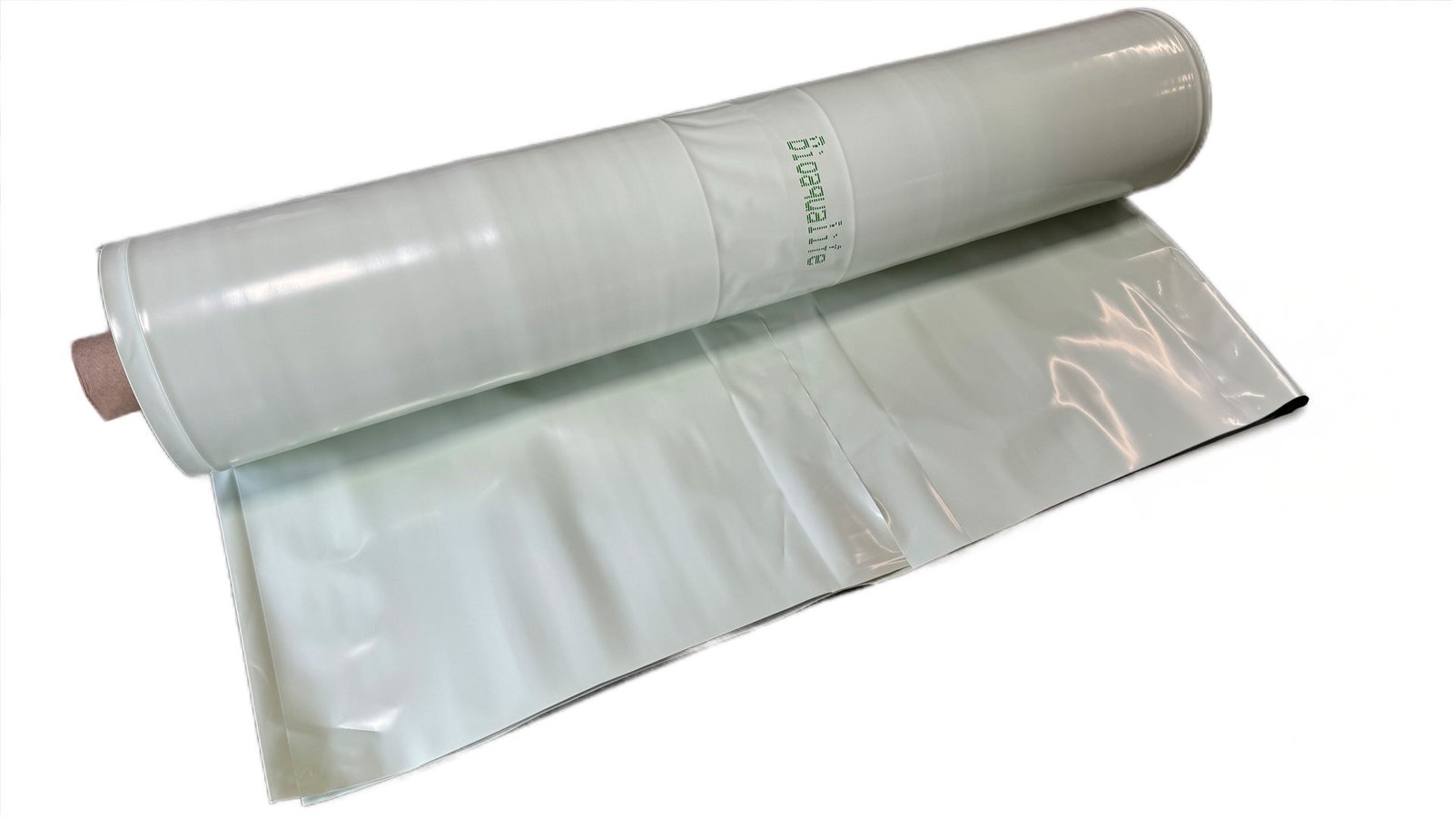 bioaqualife: A large roll of translucent biodegradable plastic film is partially unrolled, revealing a smooth, shiny surface. The word "Biodegradable" is printed on the film.